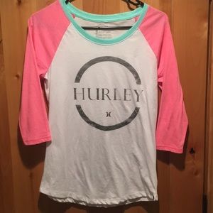 3/4 sleeve Hurley shirt.